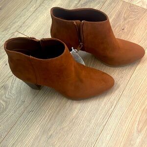 New with tags ankle boots. Never used